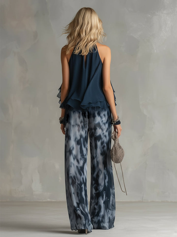 Marie | Ensemble élégant avec haut dos nu bleu marine et pantalon large imprimé